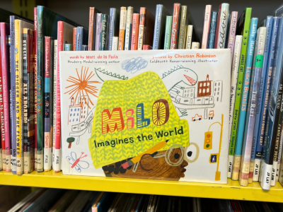 Image of a picture book called Milo Imagines The World on a shelf 